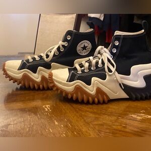 Black and white Converse thick sole sneaker